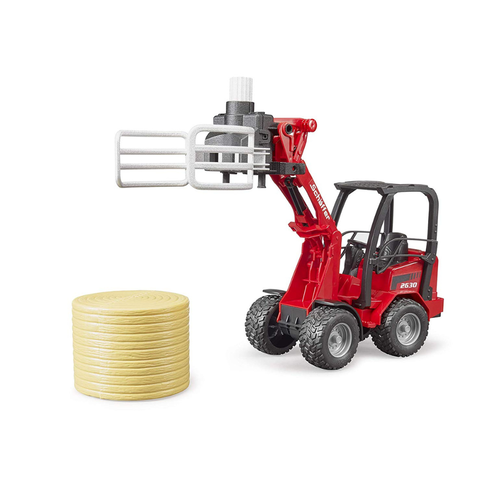 Schaffer Compact Loader 630 with Bale