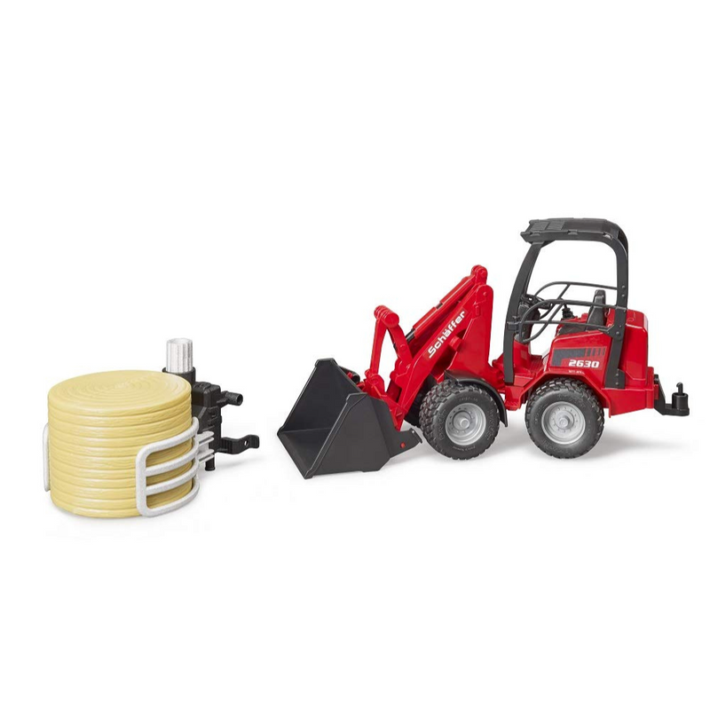 Schaffer Compact Loader 630 with Bale