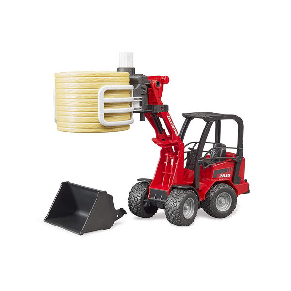 Schaffer Compact Loader 630 with Bale