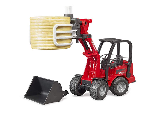 Schaffer Compact Loader 630 with Bale